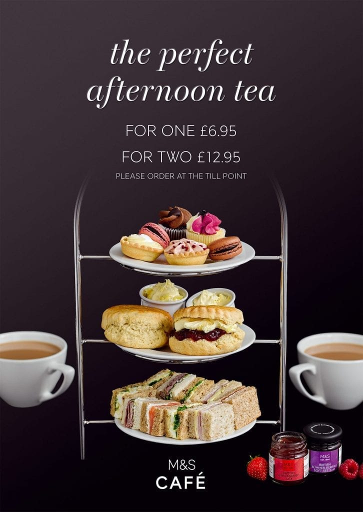 M&S Afternoon Tea with cakes, macaroons, scones and sandwiches served with tea