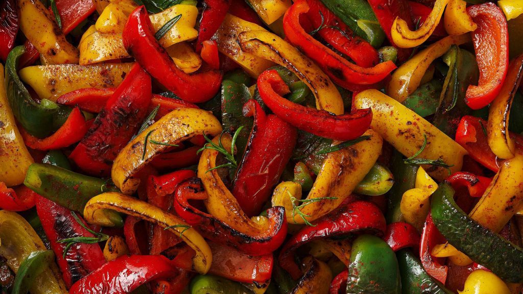 tesco quality seal roasted green red yellow peppers macro image