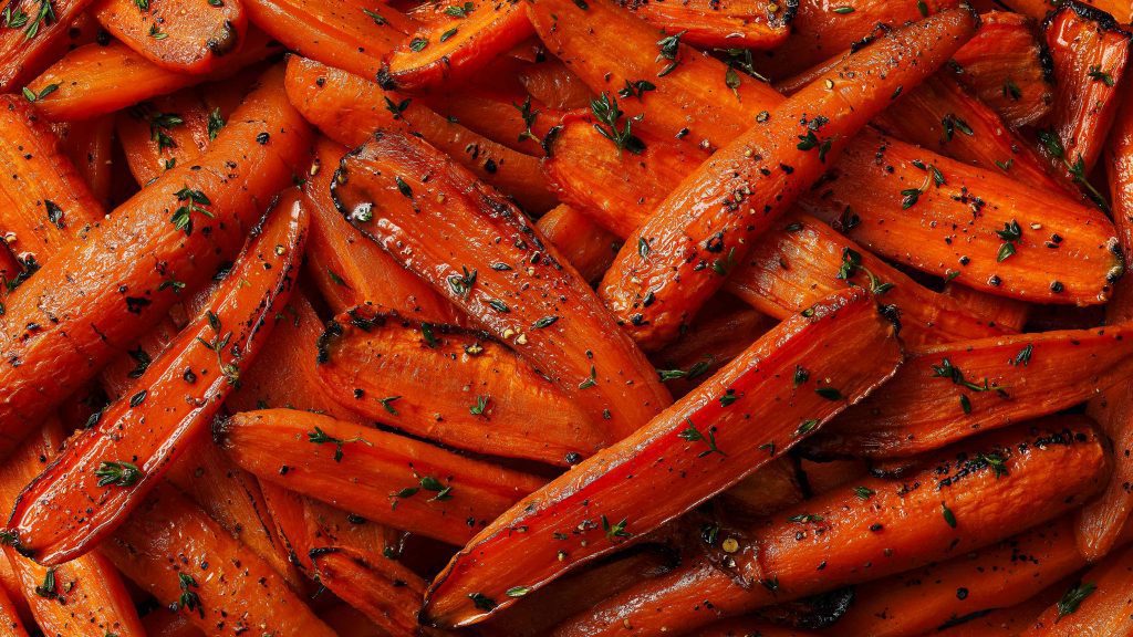 tesco quality seal roasted carrots with thyme macro image