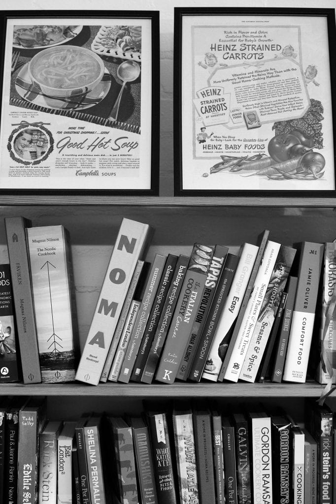 various food recipe books on shelves at gareth morgans food photography studio
